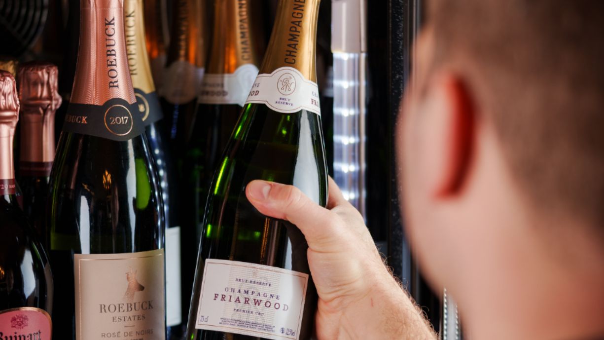 A curated selection of premium drinks for Mother's Day, featuring Seatrus Gin, Deutz Rosé Champagne, and Tar & Roses Pinot Grigio, elegantly displayed in a stylish setting.