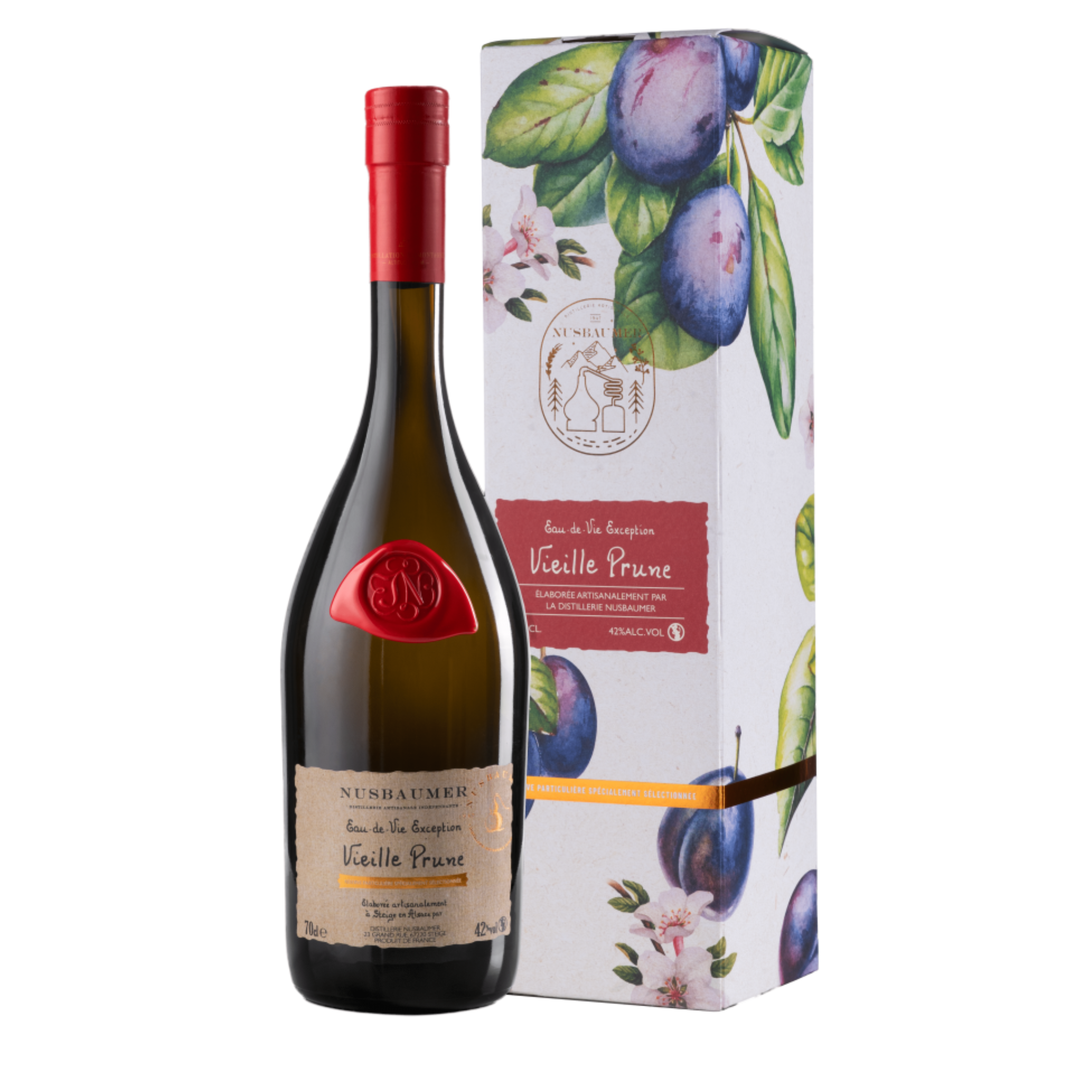 Wine bottle with red cap and label next to its decorative box featuring fruit illustrations on a white background