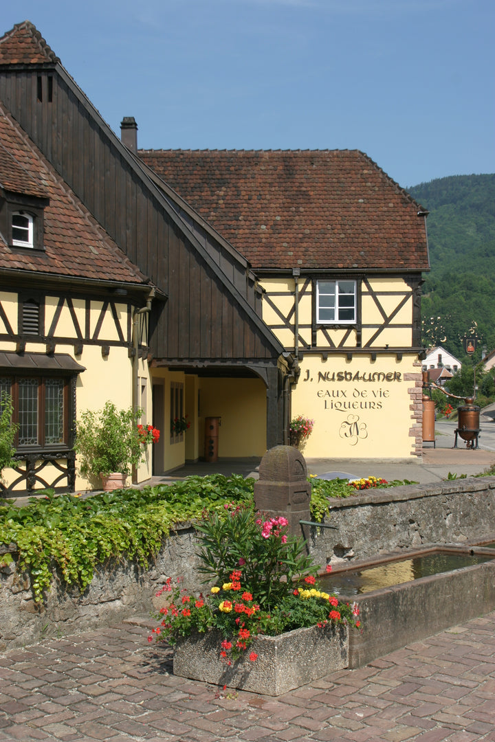 Traditional building with a sign in a quaint village setting